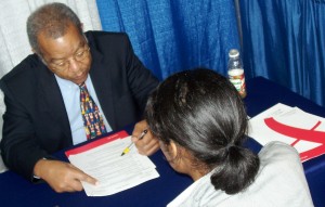 reginald_stuart McClatchy Corporate Recruiter Reginald A. Stuart interviews a candidate at a job fair.