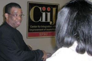 Larry Olmstead talks with Lanita Pace Hinton after his talk at the CIIJ conference.
