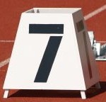Number 7 marking   a lane on a running track