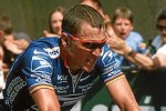 Lance Armstring on bicylce, blue jersey